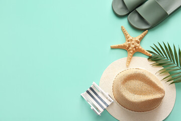 Beach accessories, starfish and decorative deckchair on turquoise background