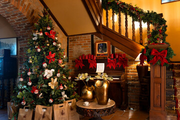 Christmas tree illuminating rustic home in asturias, spain
