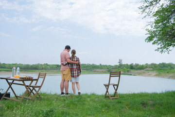 Family on picnic near the lake