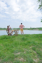 Couple on picnic near the lake