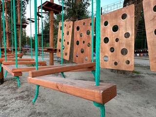 Rope park. Construction of rope parks on trees. A rope park, or a tie park, is an amusement park on which various elements are installed, such as bridges, cable crossings, stairs and bungee jumps