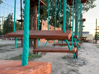 Rope park. Construction of rope parks on trees. A rope park, or a tie park, is an amusement park on which various elements are installed, such as bridges, cable crossings, stairs and bungee jumps