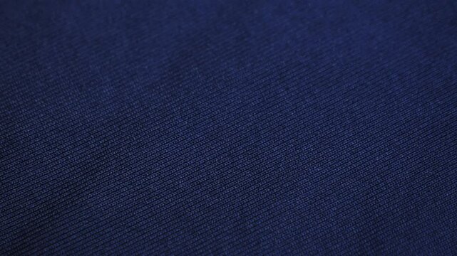 Dark blue textile close up footage, texture and background concept. High quality 4k footage