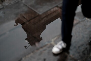 Urban life: reflections of architecture on water mirrors