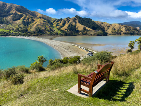 Scenic Rotokura / Cable Bay, New Zealand. Naturally occurring causeway to Pepin Island, caused by strong currents and rock source. View from seat on Sentinel Hill. Wakapuaka Estuary.