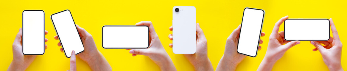 Set of modern mobile phones with blank white screens in hands on yellow background