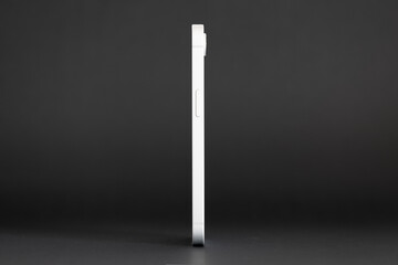 Sleek Thin Side of Mobile Phone on Black Background