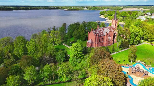 Gothic Architecture Of The Lithuanian Evangelical Reformed Church In Birzai, Lithuania. Aerial Drone Shot