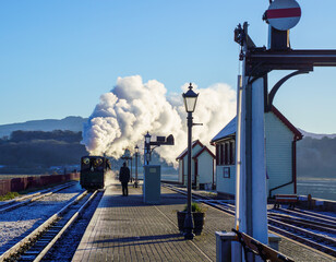 Steam train running in the winter