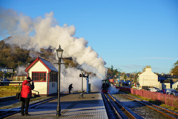 Steam train running in the winter