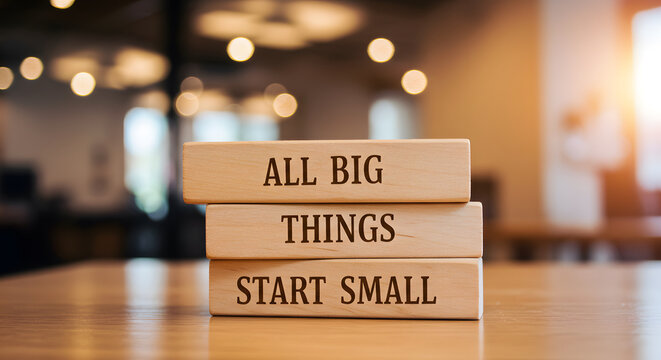 Wooden block with the message "All Big Things Start Small", symbolizing growth and humble beginnings