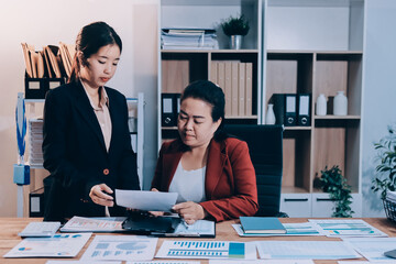 Business meeting time. Business man and business woman working on startup project.