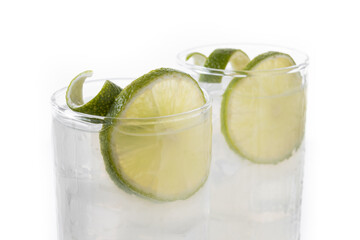 Gin Fizz cocktail with lime isolated on white background. Close up