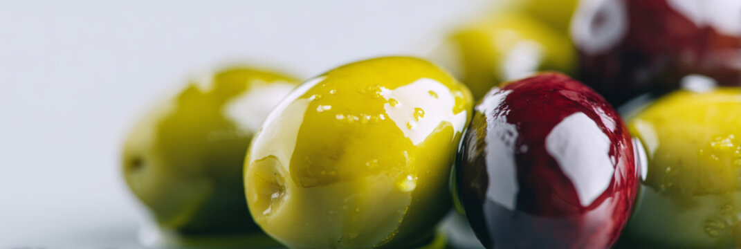 Glistening olives exude Mediterranean charm, perfect for Olea Festival celebrations and ancient culinary traditions