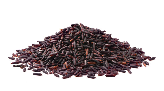 Pile of riceberry grains on white background.