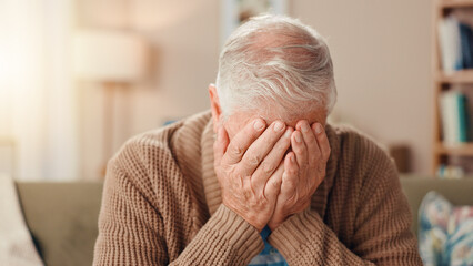 Crying, senior man and grief in home, sadness or emotional for loss in living room or mental health. Depressed, elderly person and tears for bad news, memory and mourning in lounge, lonely or unhappy
