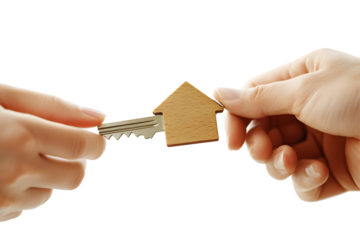 Hands exchanging house key symbolizing property ownership and real estate transfer