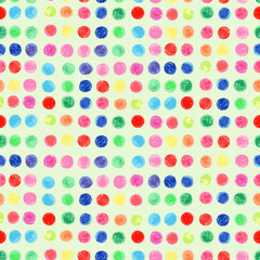 Seamless vectorial repeating pattern with coloured balls or dots on a light background