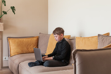 Modern digital classroom with teacher and student using laptops. Learning programming or digital...
