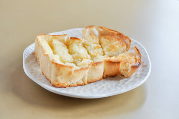 toast or bread with butter topping , toast bread or sliced bread