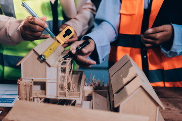 Engineers are helping to design work on blueprints and collaborate on structural analyzing of project types.