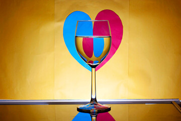Close-up of a crystal wine glass under natural lighting, showcasing its transparent elegance and delicate details.