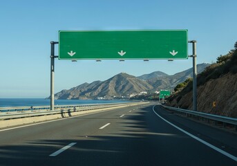 Empty highway with green road signs and mountains by the seashore