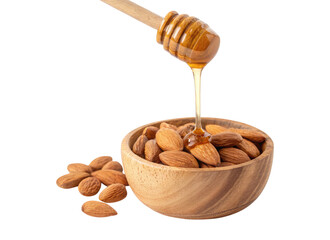 Golden honey dripping from a wooden dipper into a wooden bowl of almonds isolated on a transparent background png