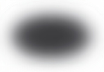 Dark circular shape on white background with blurred edges creating a soft effect.