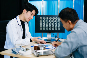 Doctor explains MRI brain scan while patient signs treatment form.  hospital service scenes.