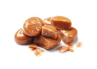 Broken tasty caramel candies isolated on white