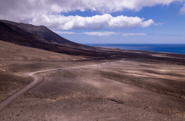 Aerial view of winding road through arid landscape, Jandia, Fuerteventura