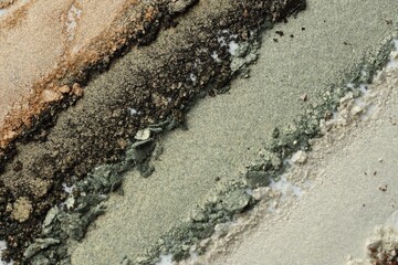 Colorful eyeshadows as background, above view. Cosmetic palette