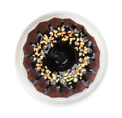 Delicious chocolate bundt cake with nuts isolated on white, top view