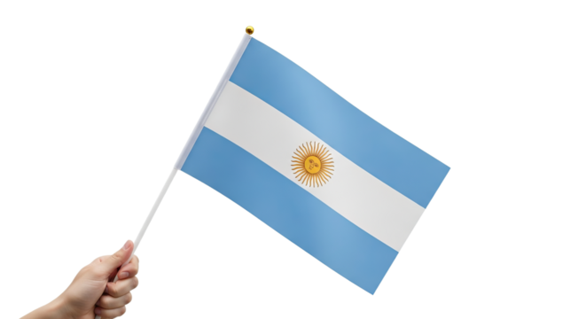 Hand holding an Argentinian flag against a white background with no blur for clarity and focus on the subject