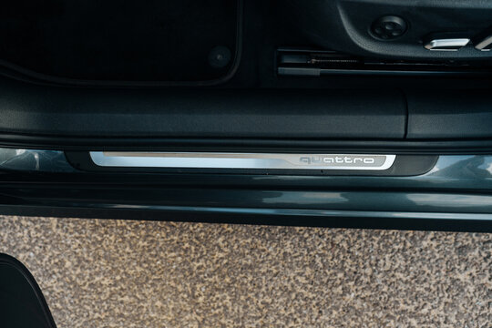 Interior of the Audi A6 C7 Lift Avant S-line. Premium Black leather, steering wheel, buttons, console with gear and wide screen. Luxury car cabin design. Marketing, advertising or press articles.