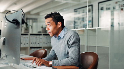 Fototapeta premium Computer, typing and man in call center for help or online assistance admin. Communication, contact us and customer service with employee in office for feedback or support as virtual assistant