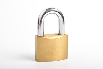 Naklejka premium Locked golden padlock isolated on white background