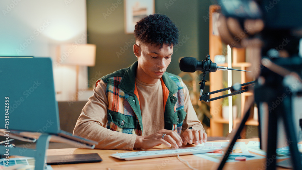Aufkleber man, influencer and typing in recording studio for audio podcast or content creation at home. male p