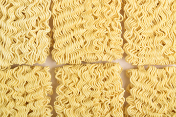 Raw instant noodle background. Texture of raw instant noodles