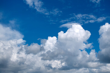 Rain clouds forming on blue Florida sky. Colorful summer skyscape