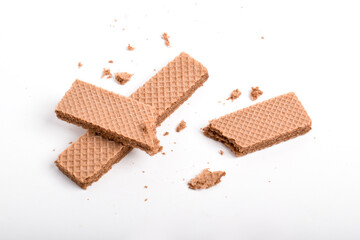 Chocolate wafer with crumbs isolated on white background.