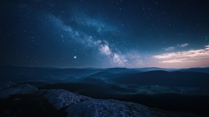 Obraz premium A breathtaking night sky with the Milky Way stretching across the horizon.