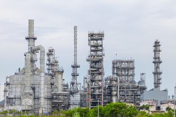 Fototapeta premium Petrochemical Petroleum Refinery Oil and Gas Tank Storage Industrial landscape of power energy industry building