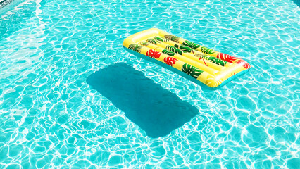 Tropical Pool Float on Vibrant Water Surface,Vacation Vibes at a Sunlit Swimming Pool