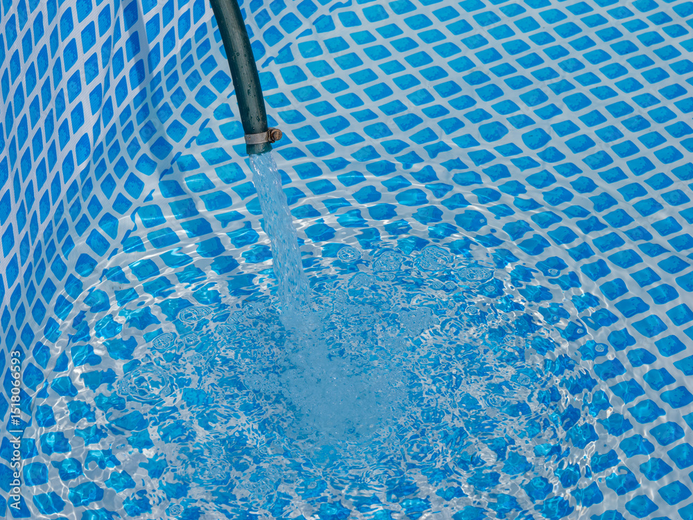 Poster a blue pool with a hose attached to it