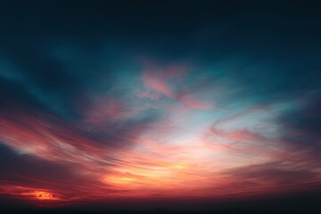 Fototapeta premium Vivid twilight sky ablaze with fiery orange, pink, and teal hues, swirling cloudscape, dramatic contrast
