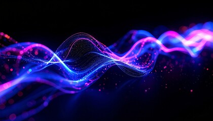 Obraz premium Abstract Light Waves with dynamic and colorful movement. The image features flowing lines of light in shades of blue and purple against a black background, creating a sense of energy and technology