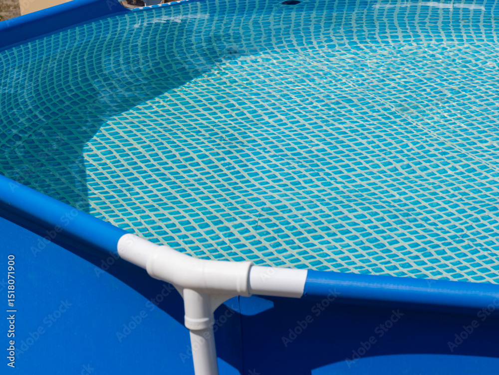 Poster a blue swimming pool with a blue netting on the bottom