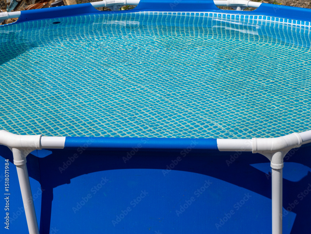 Aufkleber a blue swimming pool with a blue netting on the bottom